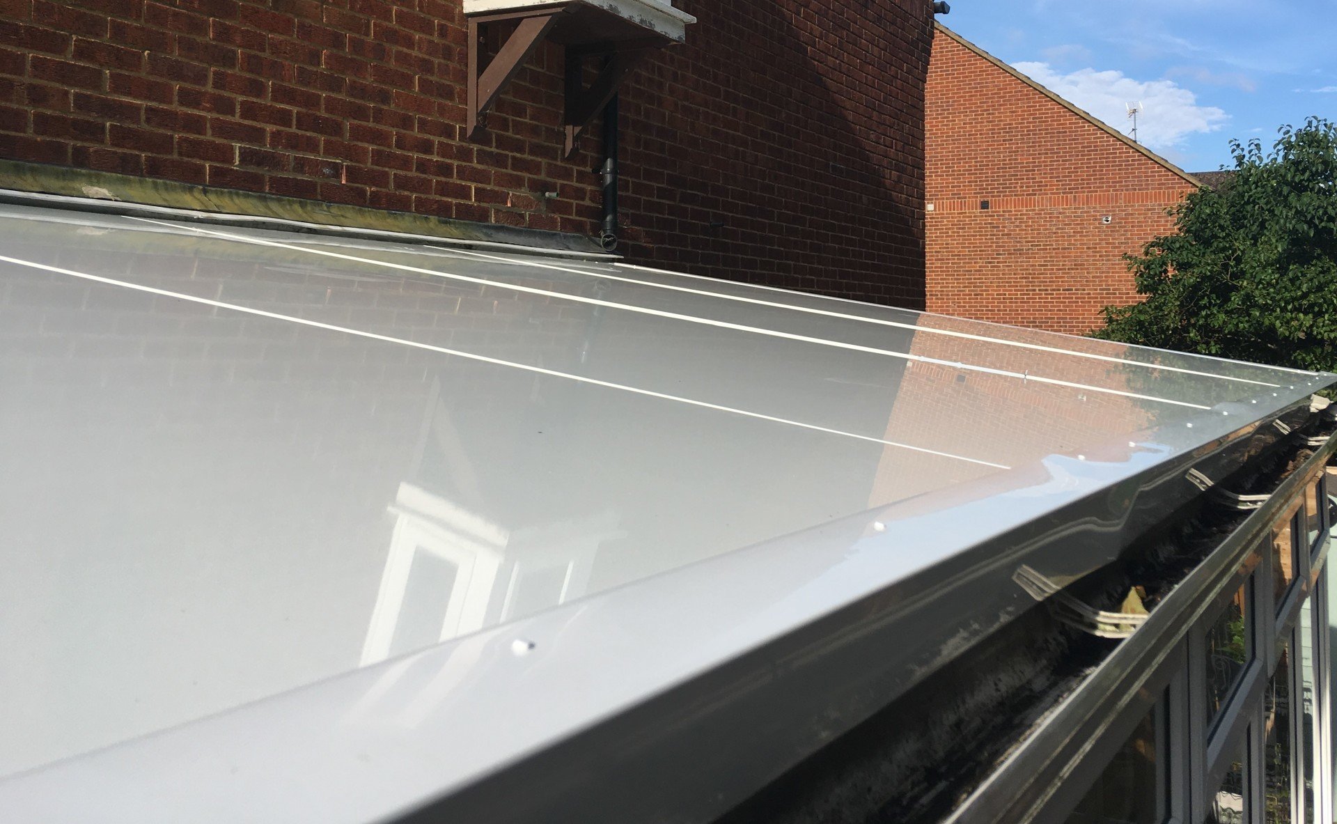 External view. 75mm thick. Flat lean-to panels