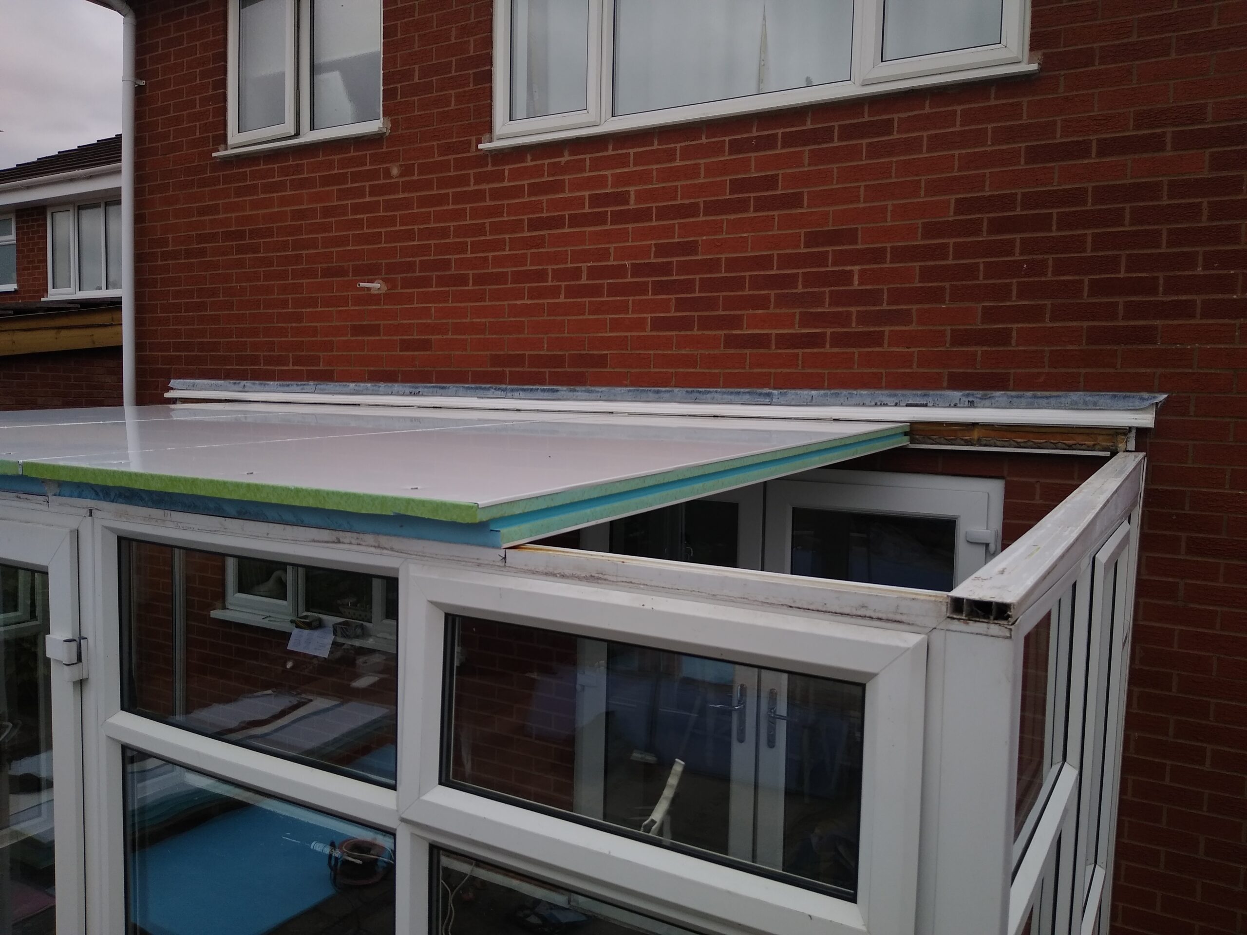 9.Fit and secure Stadur panels after cutting to length and rebating front edge flush with front frame to allow re fixing of gutter bracket support facia in original location.